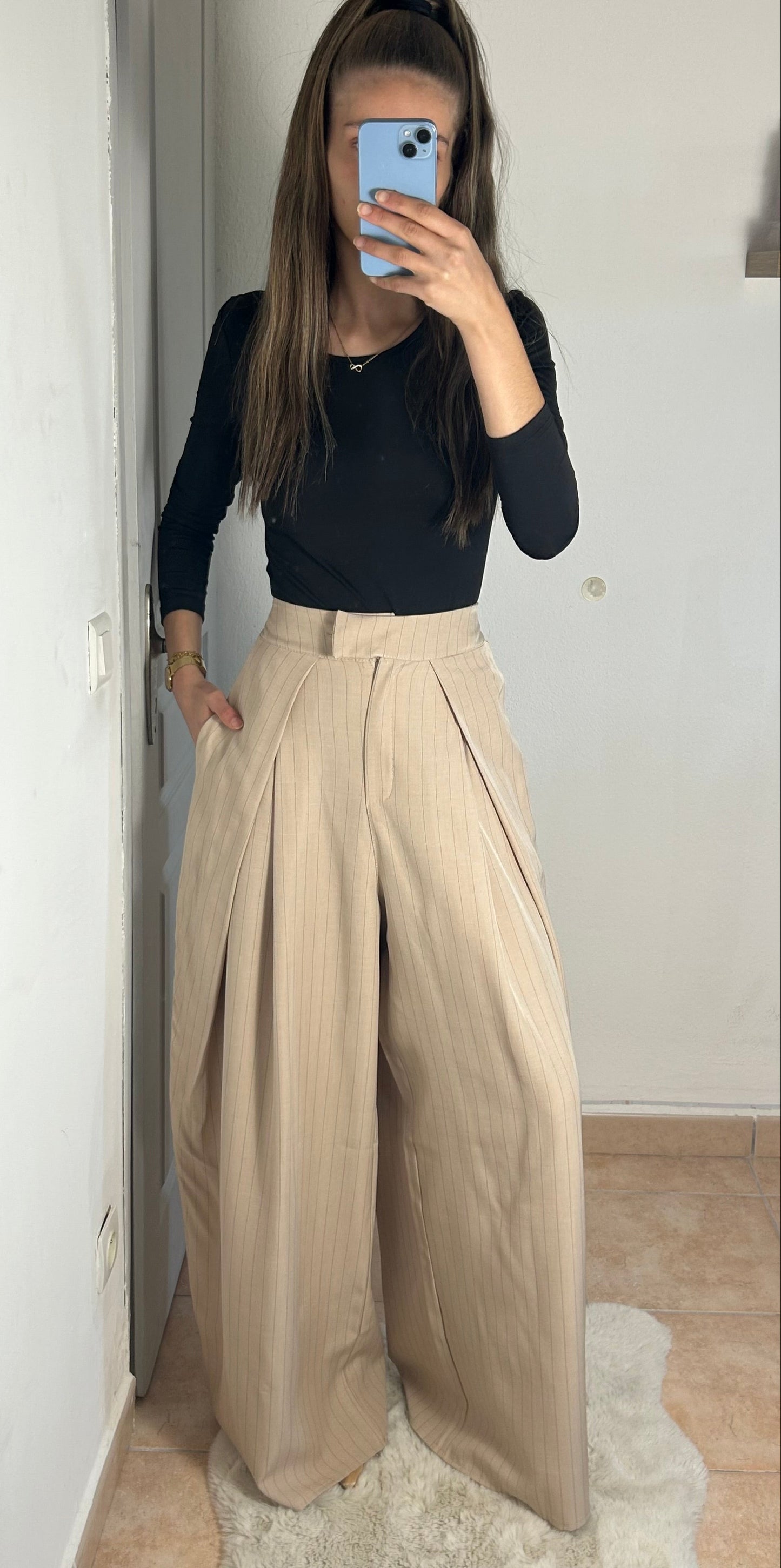 Pantalon palazzo à rayures taille haute